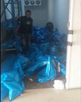 Habur'da bekletilen cenazelerle ilgili medyaya yansıyan fooğrafta, cenazelerin üst üste yığıldığı görülüyor